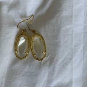 Kendra Scott Lee Gold drop earrings.  White opalescent